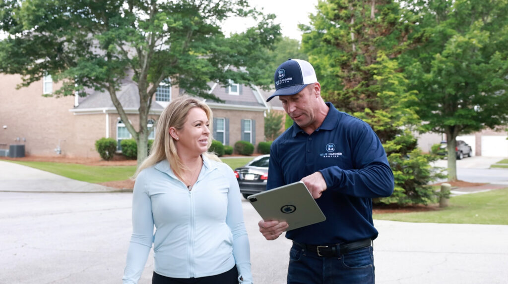 Technician talking to a customer